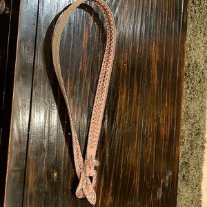 39” long pink bejeweled belt.